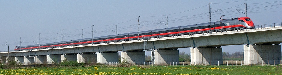 115 Header -AV Train traveling over Bridge